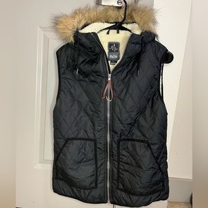 Puffer vest with fur hood and sherpa lining